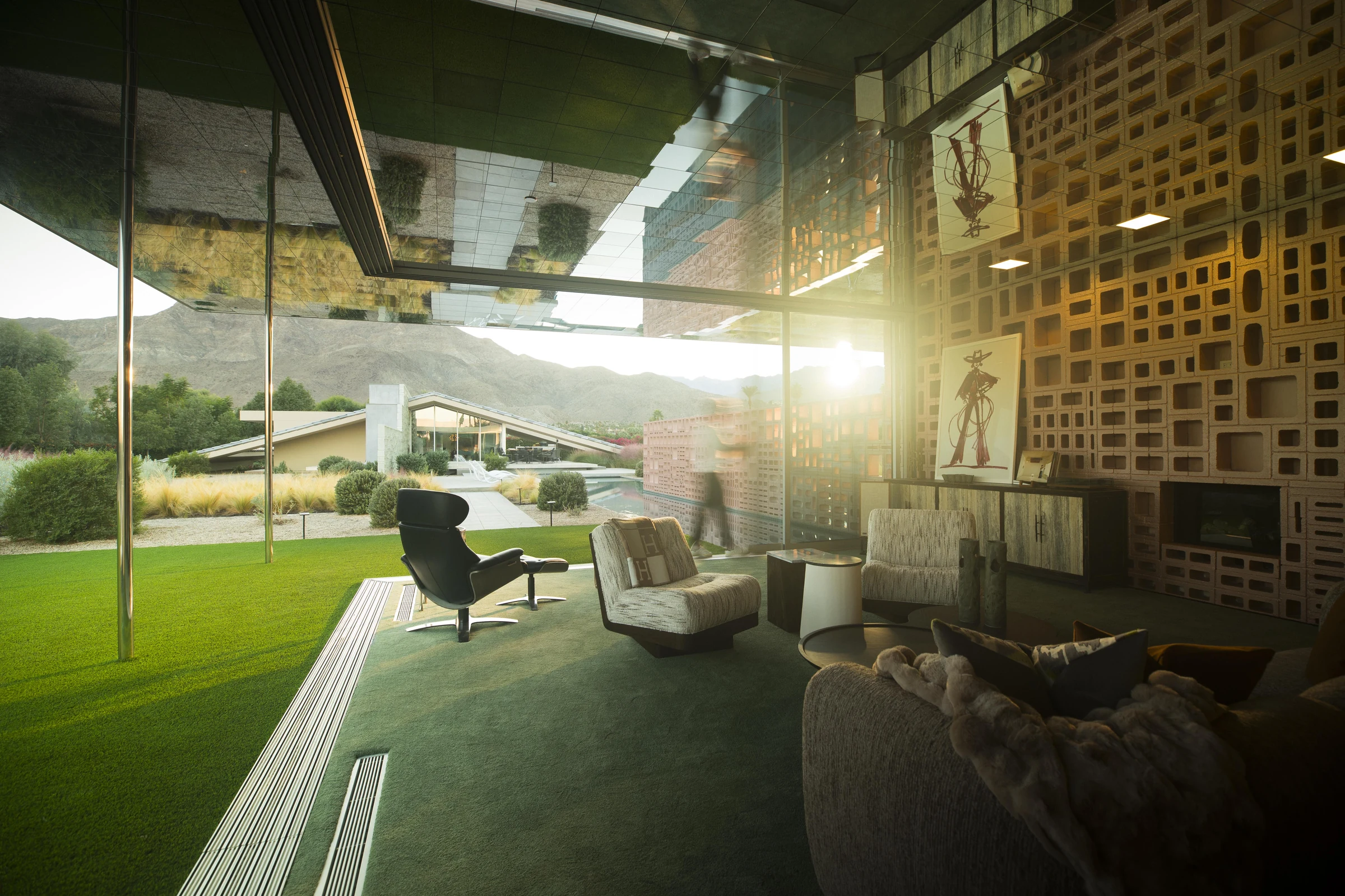Golden light and breeze-block architecture at The Dreamer Estate